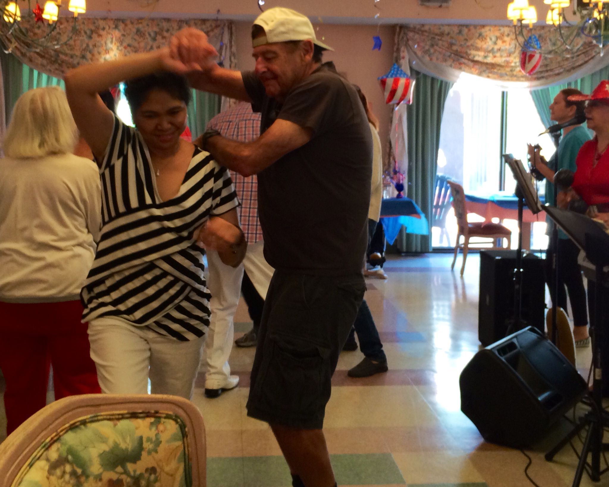 Joan's Journey - HVE Resident dances with aide on July 4 Joan's Journey - HVE Resident dances with aide on July 4